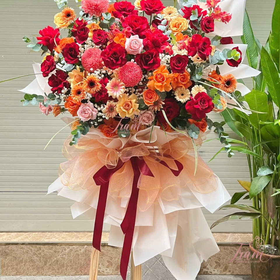 KỆ HOA TONE ĐỎ CAM VÀNG – RỰC RỠ MAY MẮN & THÀNH CÔNG